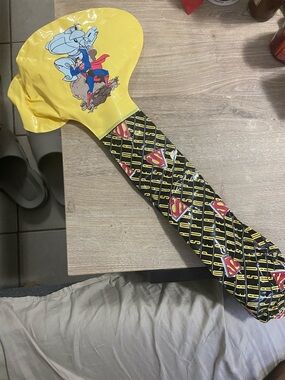 1997 DC Yellow & Black Superman Logo Inflatable Hammer Toy